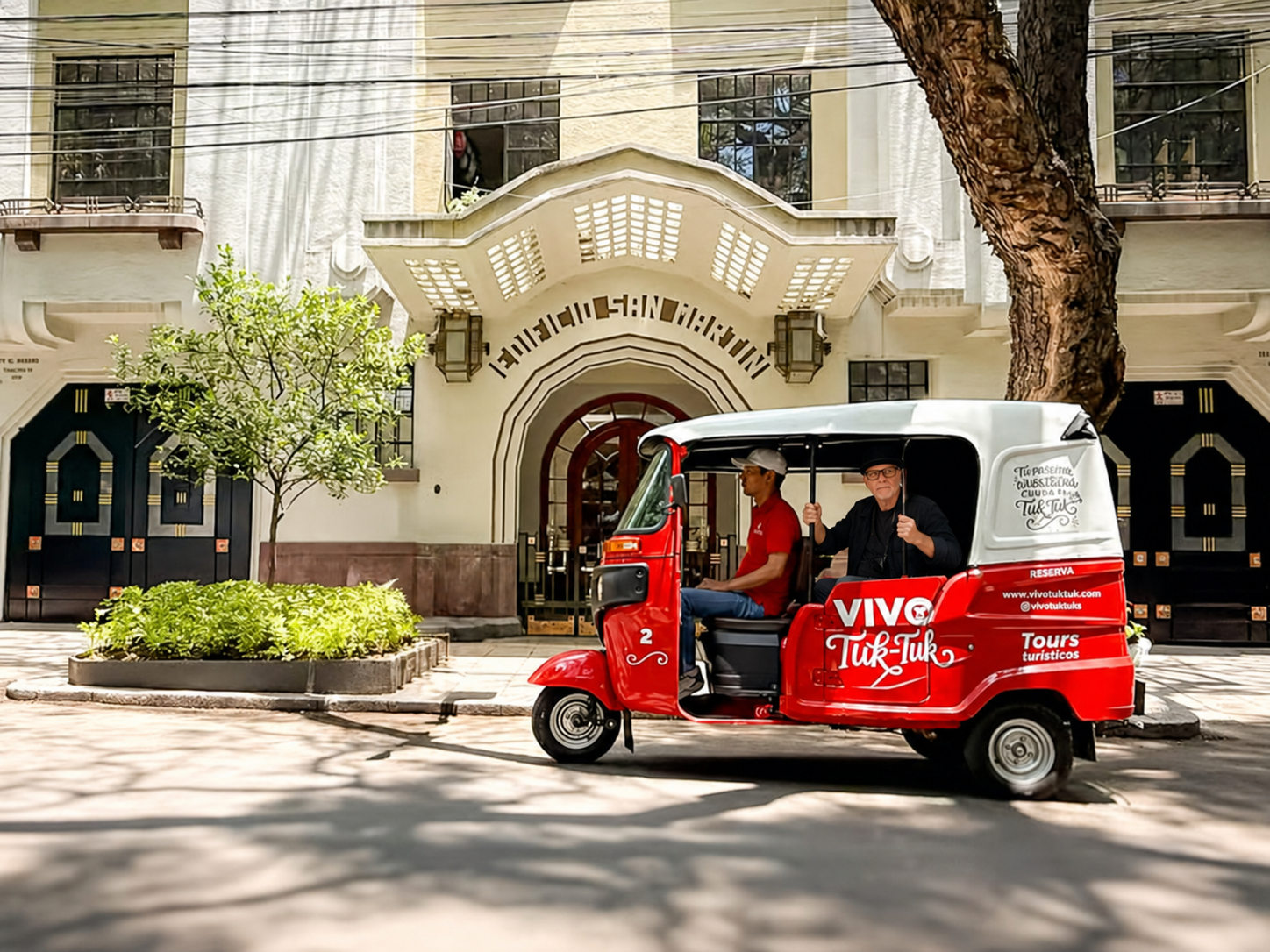 Dave enjoying a colorful tuk-tuk tour through Mexico City